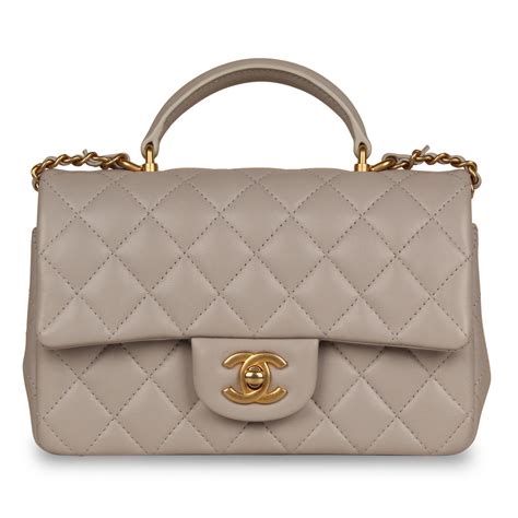 chanel original flap bag mini|Chanel mini flap bag with top handle.